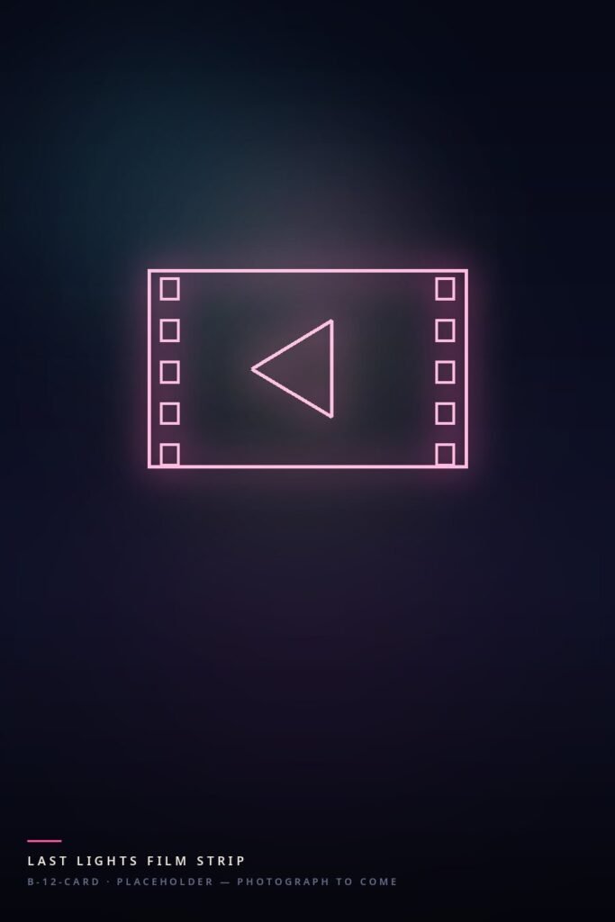 A strip of film in pink neon