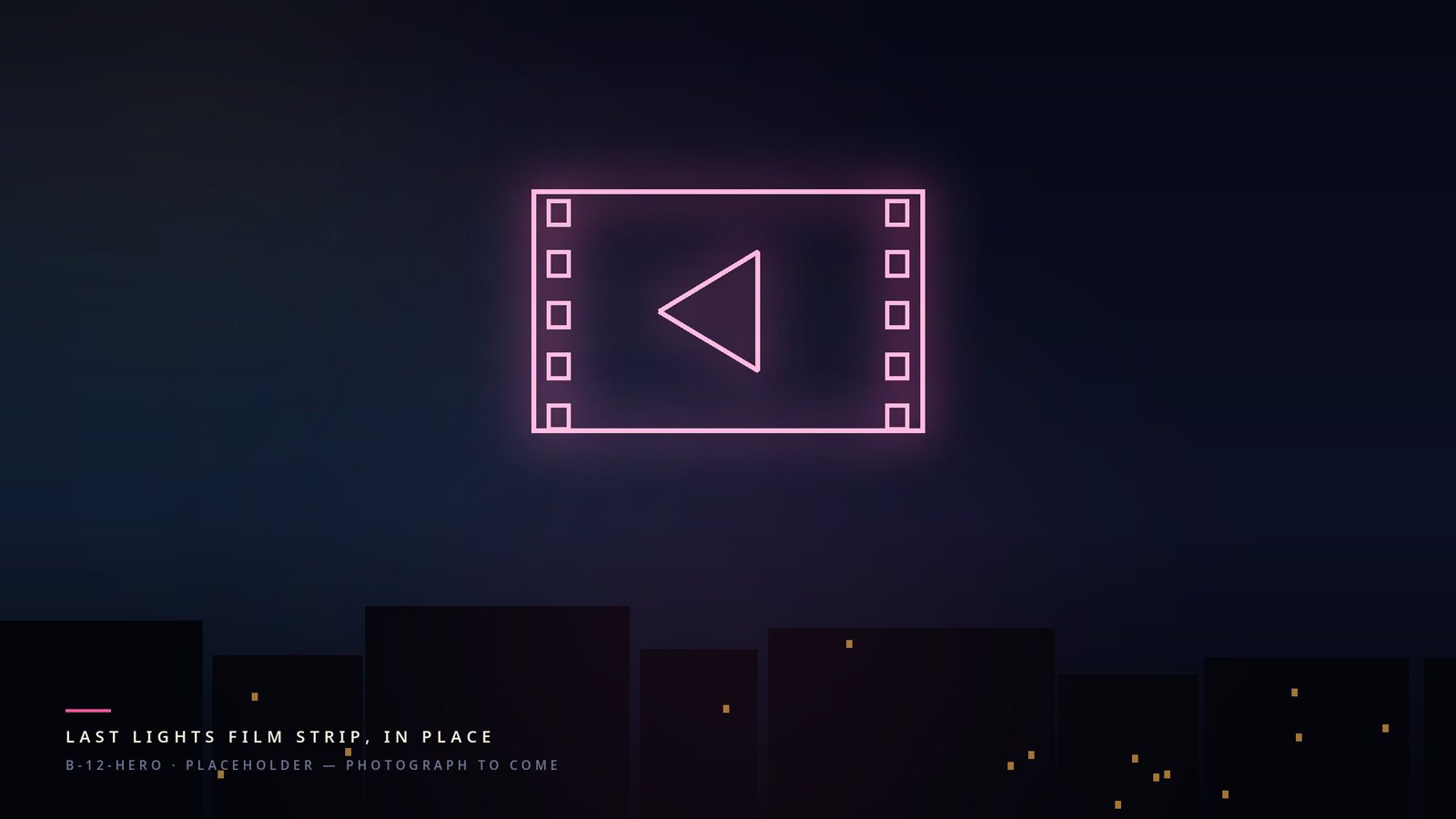 A strip of film in pink neon