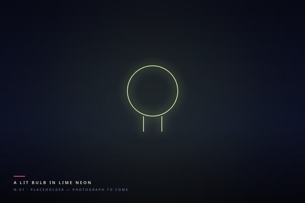 A lit bulb in lime neon